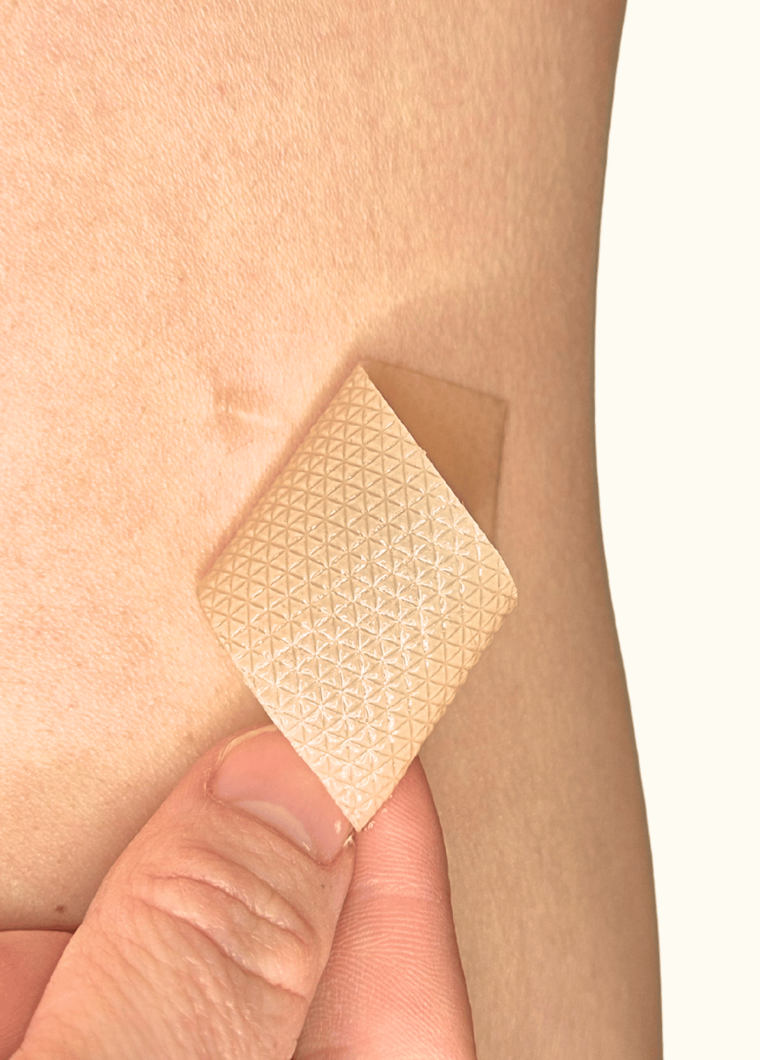 LumeCeuticals silicone scar tape covering a scar to improve the appearance of discoloured and raised scars